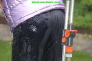 Watch Sandra taking a shower in her new purple shiny nylon down jacket 