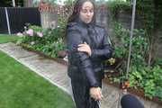 Watching Aiyana wearing a sexy black shiny nylon rainpant and a black shiny nylon down jacket trying the garden shower  (Pics)