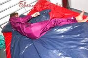 Alina preparing her bed for relaxing and lolling on the bed wearing a sexy shiny nylon rain pants and a rain jacket (Pics)