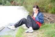 Enni outdoor wearing shiny nylon shorts rain pants and rain jacket (Pics)