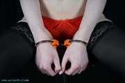 Mitzi in lingerie and high security handcuffed