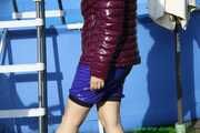 Watch Chloe enjoying the Summer in the Garden her shiny nylon Downjacket