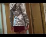 Pia wearing a supersexy red shiny nylon shorts and a silver rain jacket posing infront of the mirror (Video)