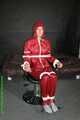 Watch Pia enjoying her Rainsuit bound and gagged on a Hairdresserchair