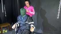 Sexy Ajyana being tied, gagged, hooded and dominated by Stella wearing sexy shiny nylon rainwear on a hairdresser´s chair Part 2 of 2 (Video)