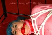 Mara tied and gagged on a princess bed in an old cellar wearing supersexy shiny pink downwear (Pics)