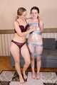 Bekki and Kelly - Sisters are taped and wrapped together face to face