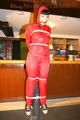 Jill tied and gagged on a pillar wearing a shiny red rainwear (Pics)