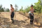 Dana and La Pulya - Bag racing in trash bags with taped hands and feet 