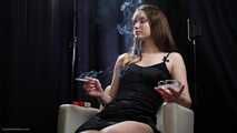 18 aged girl is smoking two 100mm Reds with a lot a nose exhales