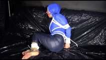 SANDRA tied, gagged and hooded with ropes and a ballgag on a sofa wearing sexy rainwear (Video)