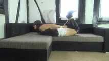 Ayu hogtied on couch 2/2