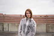 Miss Petra in transparent Hunter rain jacket and patent leggings