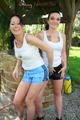 Jill and her friend having fun together outdoor both wearing shiny nylon shorts and a top (Pics)