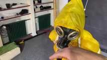 Watch Lady M bound in a yellow Rainsuit wearing a latex Hood and a Gasmask