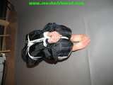 Get 24 pictures from Lupi tied and gagged in shiny nylon shorts from 2005-2008 in one package!
