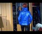 Sonja wearing a sexy black shiny skinny pant and a shiny blue down jacket trying on several shorts (Video)