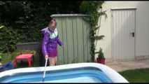 Watching Mara wearing a sexy short down skirt and a down jacket playing with water in the swimming pool (Video)